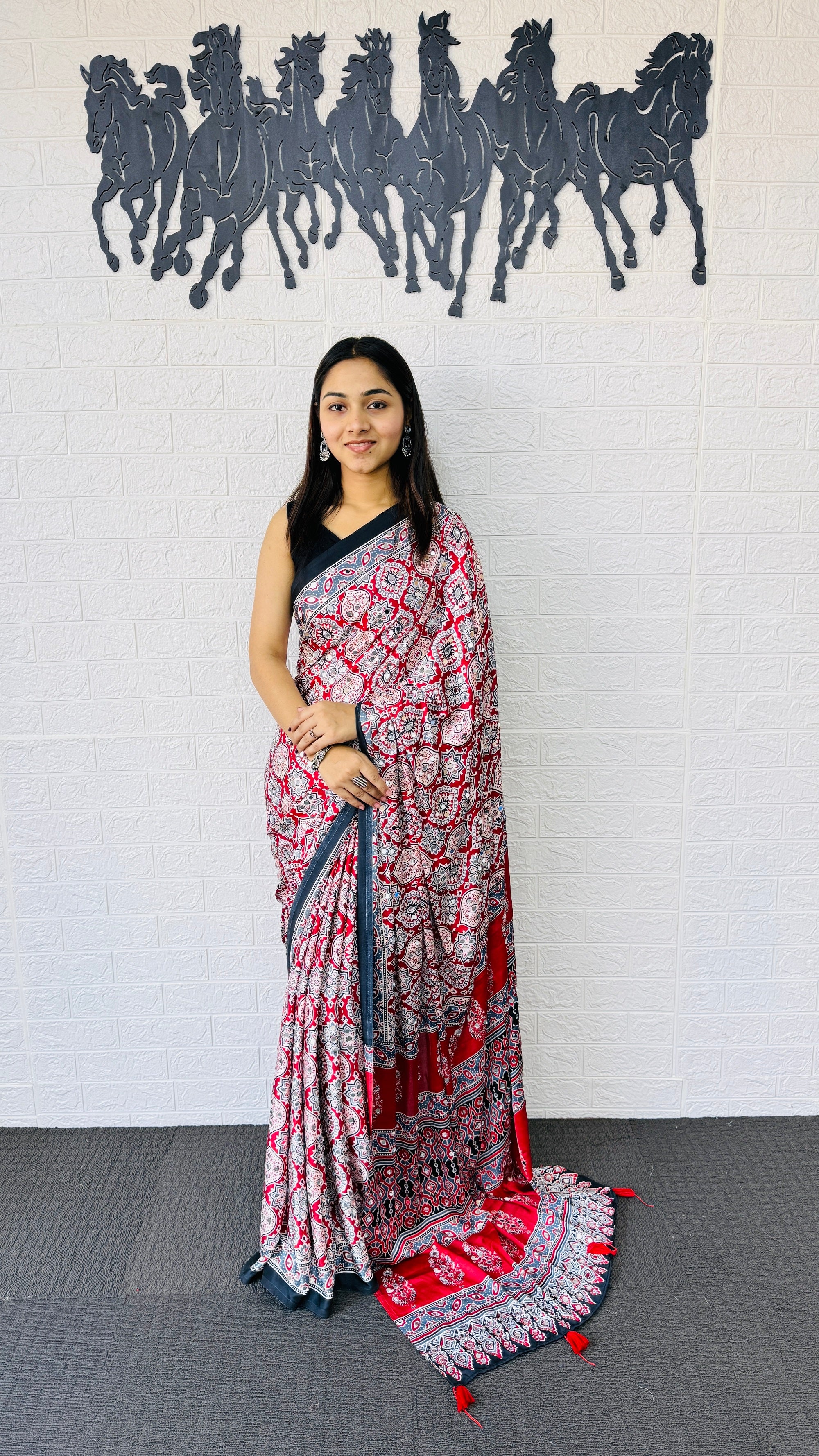 Vibrant Red Ajrakh-Inspired Printed Saree with Traditional Border & Tassel Detailing