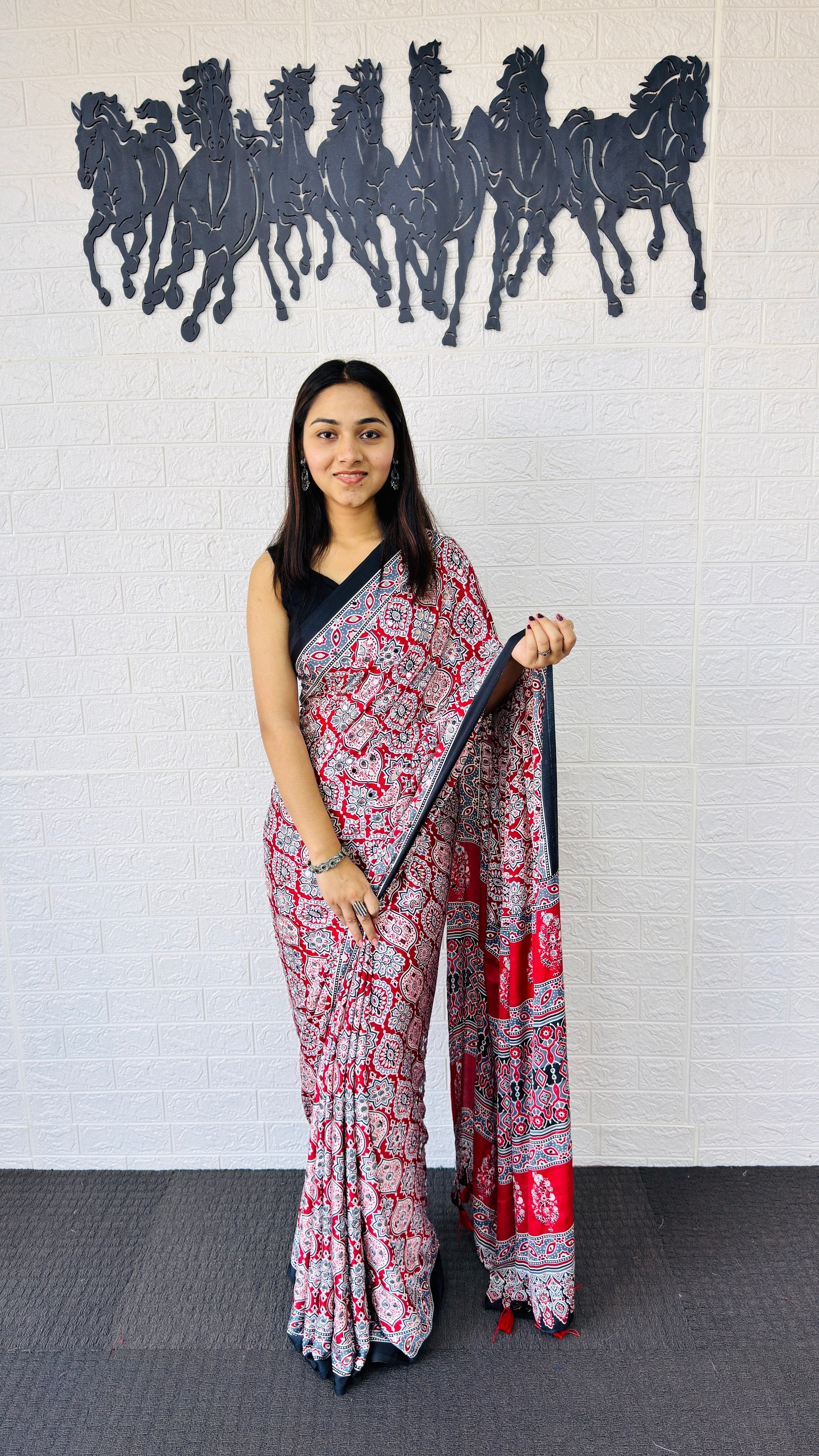 Vibrant Red Ajrakh-Inspired Printed Saree with Traditional Border & Tassel Detailing