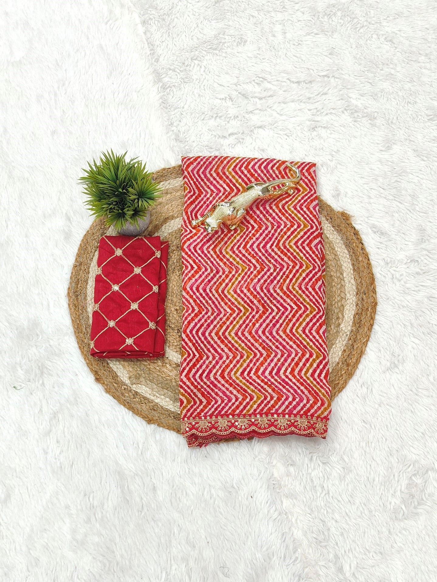 Vibrant Red Zigzag Print Designer Saree with Elegant Lace Border
