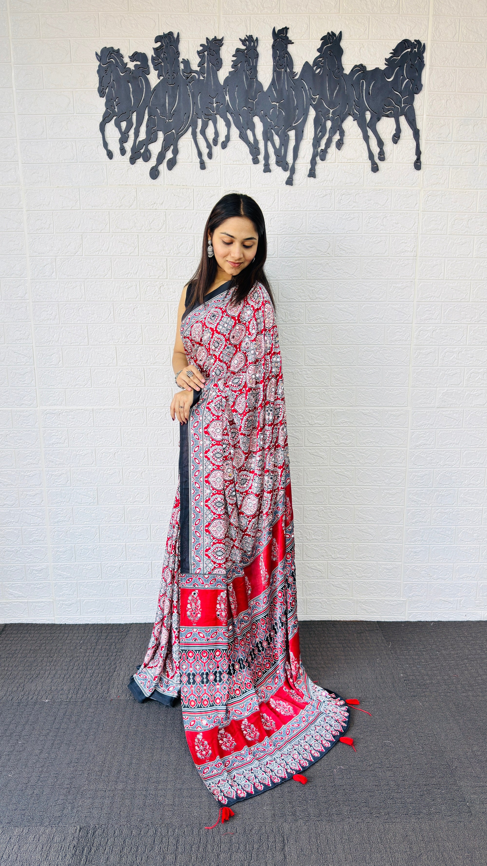 Vibrant Red Ajrakh-Inspired Printed Saree with Traditional Border & Tassel Detailing