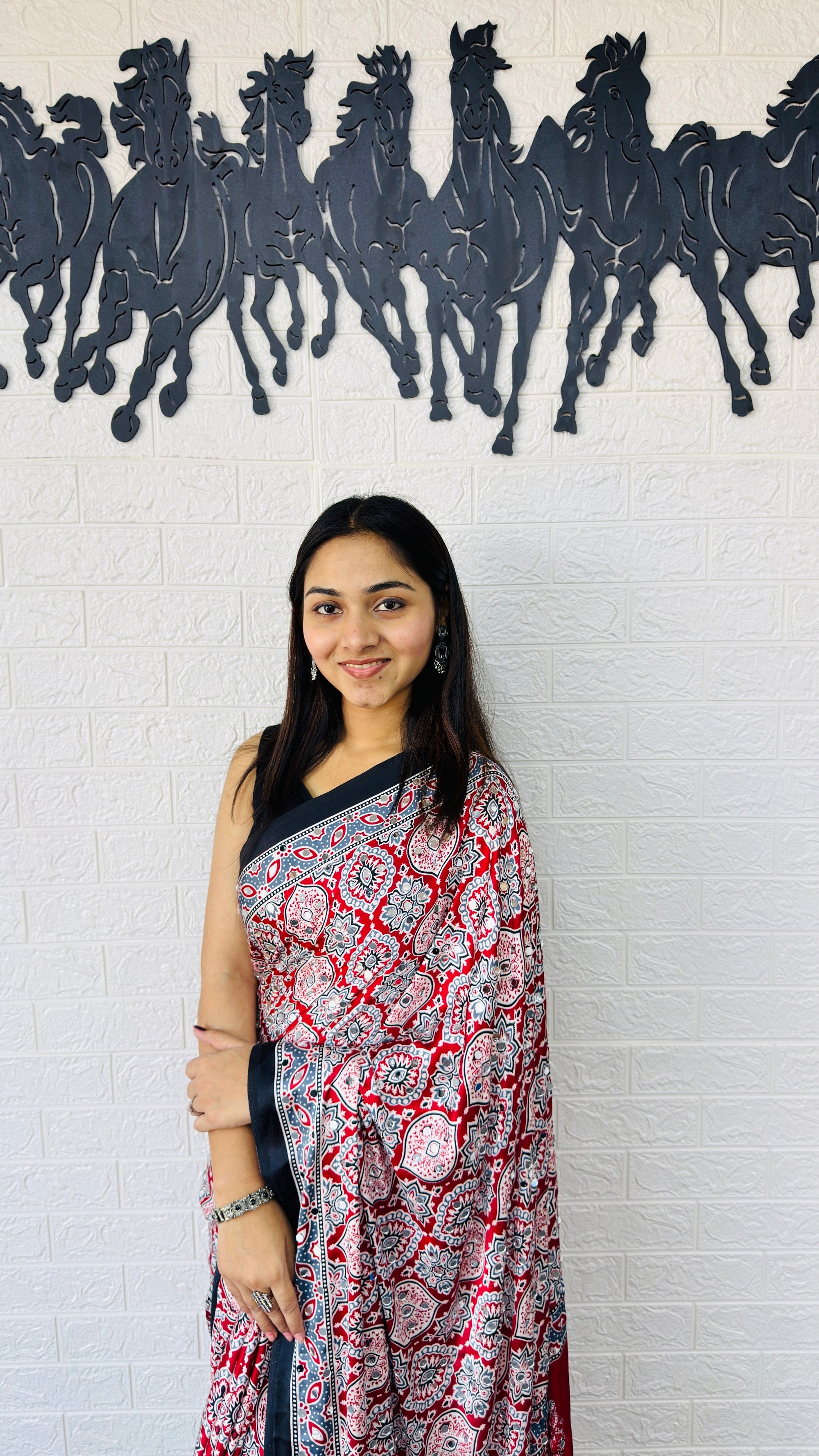 Vibrant Red Ajrakh-Inspired Printed Saree with Traditional Border & Tassel Detailing