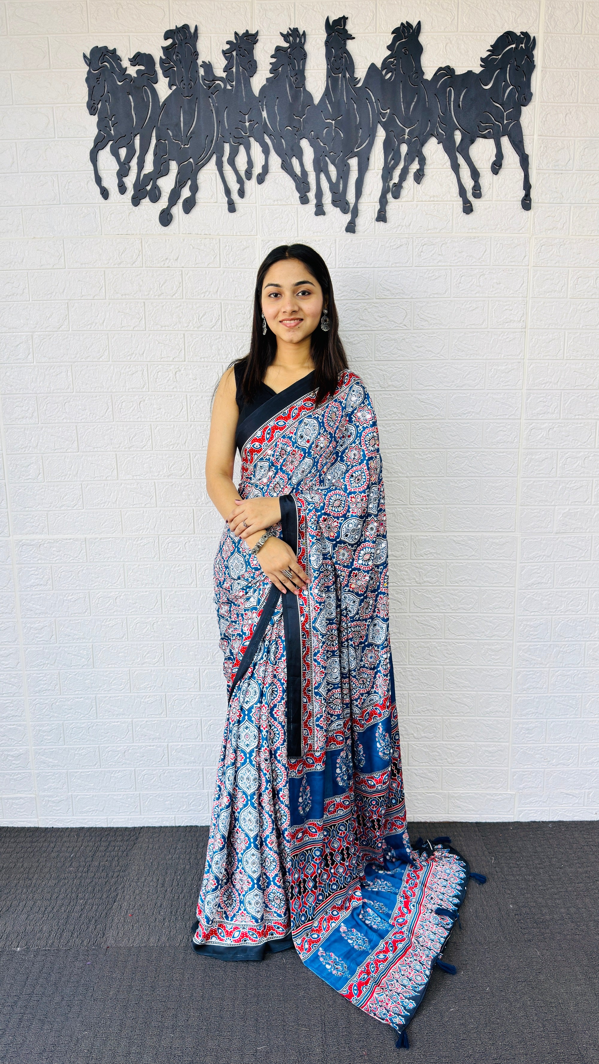Graceful Indigo Blue Ajrakh-Inspired Printed Saree with Ethnic Border & Tassel Detailing