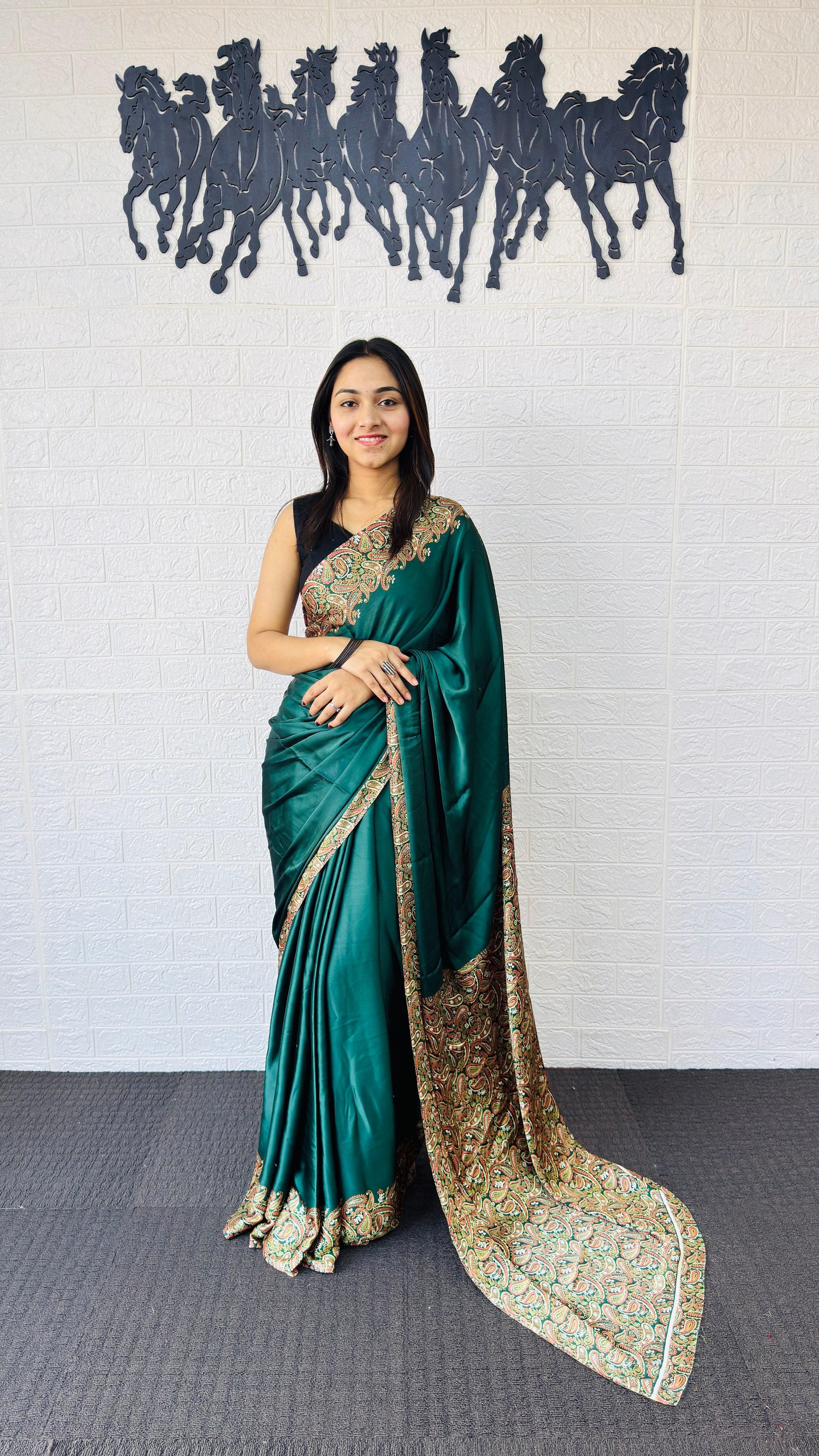 Elegant Emerald Green Designer Saree with Rich Paisley Printed Border