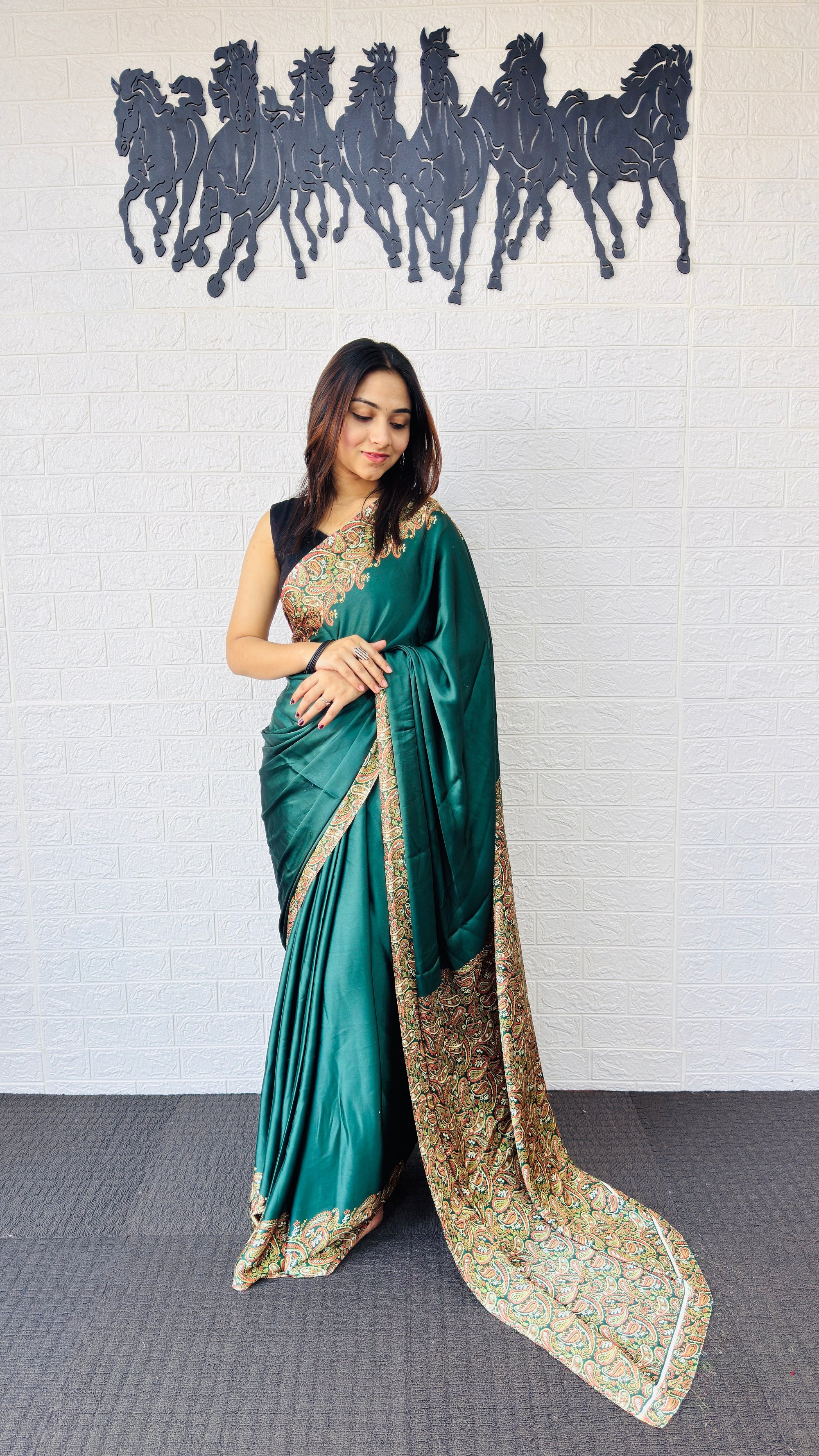 Elegant Emerald Green Designer Saree with Rich Paisley Printed Border