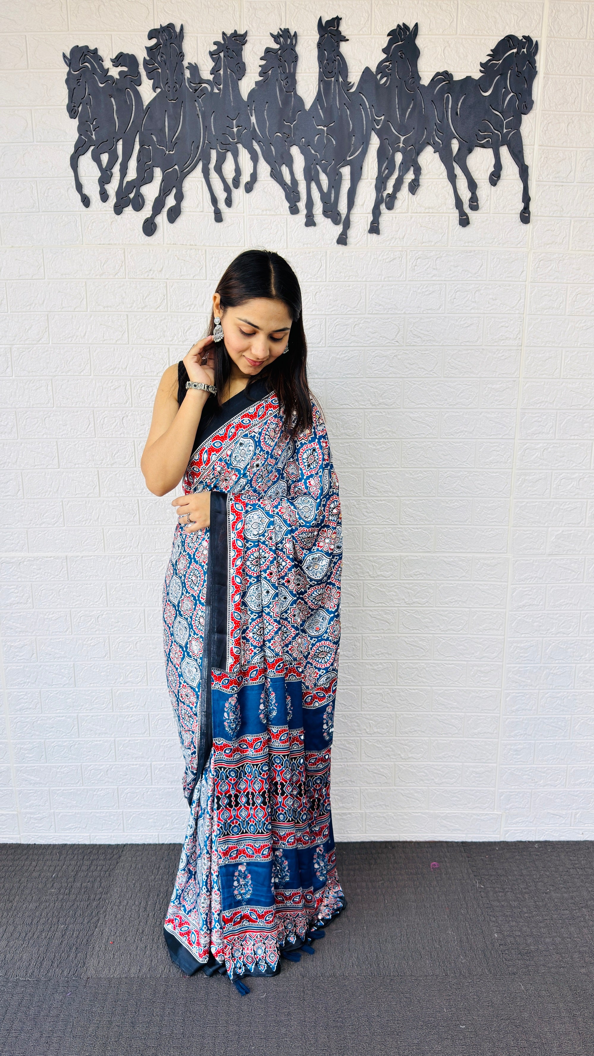 Graceful Indigo Blue Ajrakh-Inspired Printed Saree with Ethnic Border & Tassel Detailing