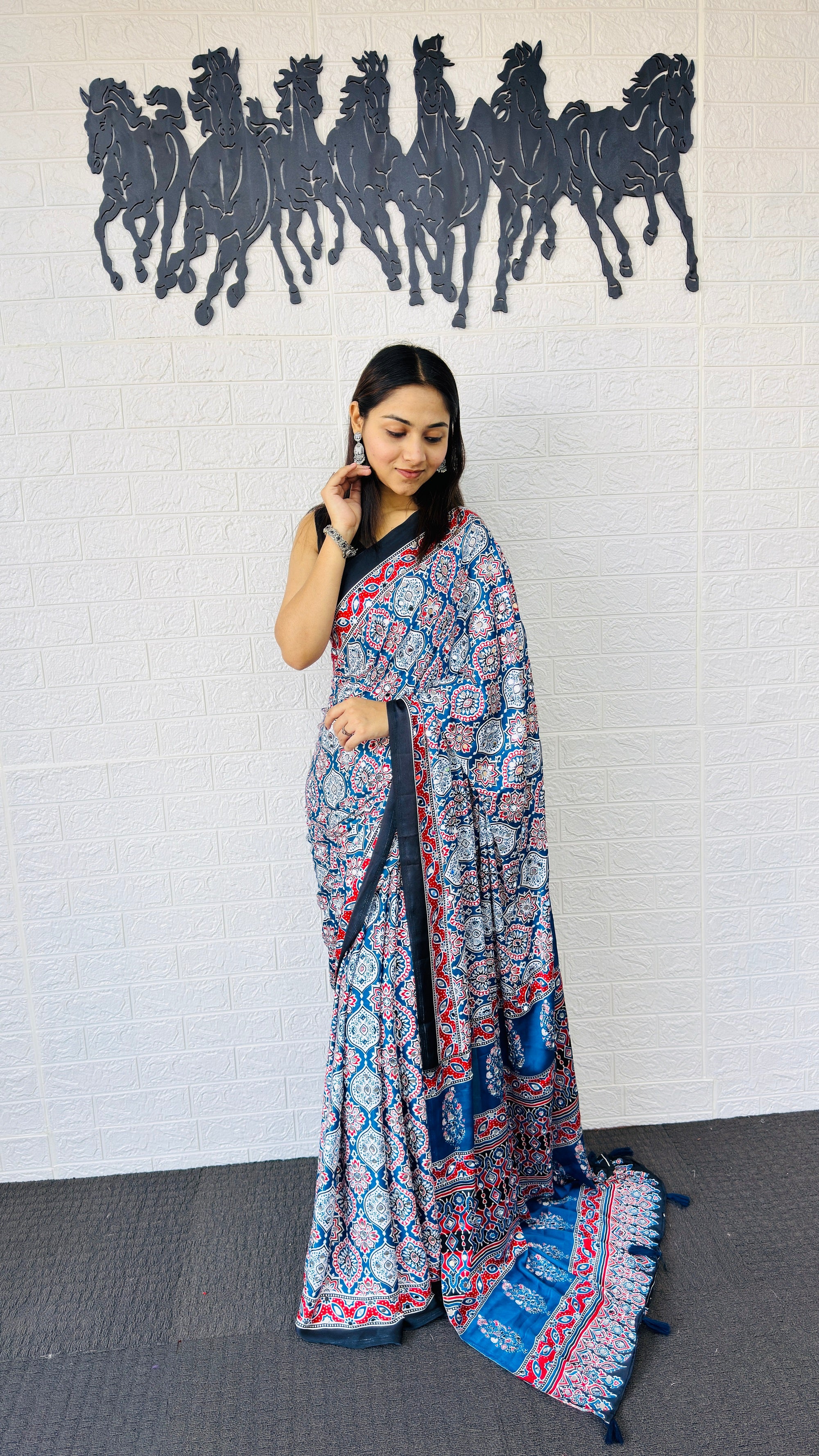 Graceful Indigo Blue Ajrakh-Inspired Printed Saree with Ethnic Border & Tassel Detailing