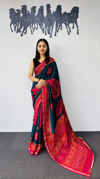 Elegant Teal Blue Designer Saree with Vibrant Pink Heritage Border