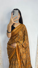 Luxury Mustard Gold Ajrakh-Inspired Printed Saree with Intricate Heritage Motifs & Grand Designer Pallu