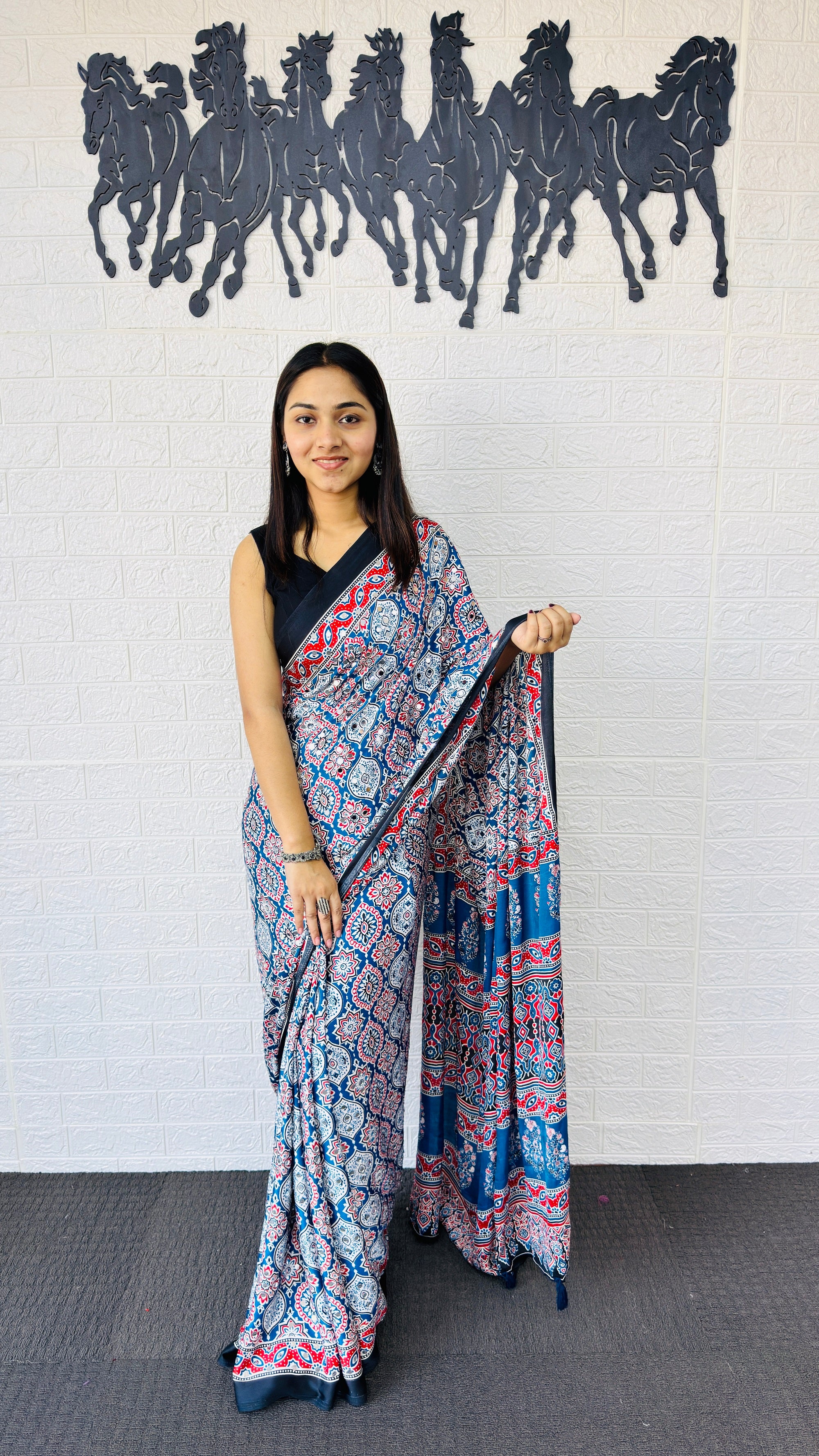 Graceful Indigo Blue Ajrakh-Inspired Printed Saree with Ethnic Border & Tassel Detailing