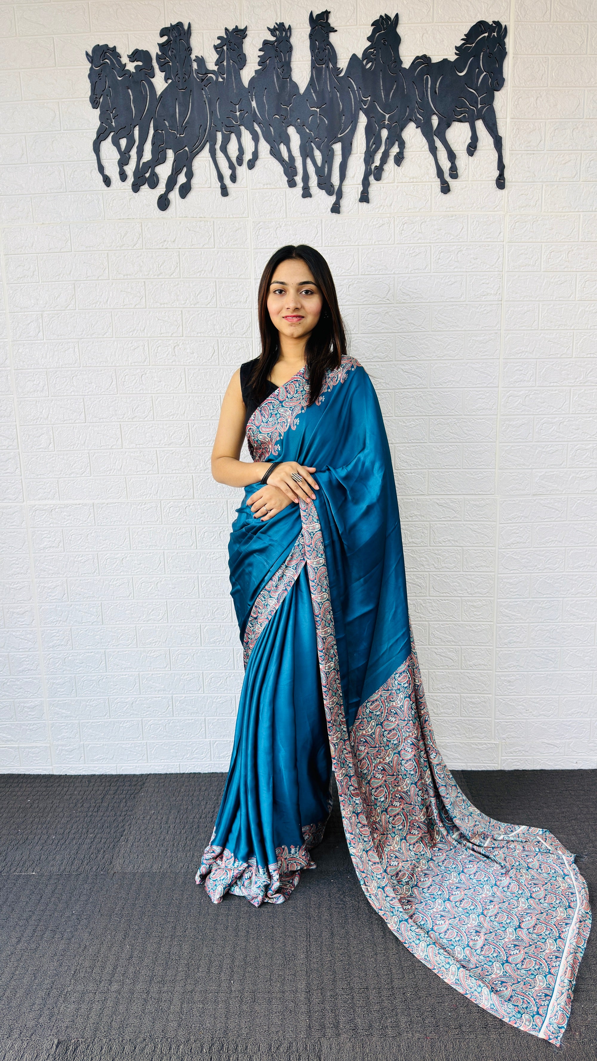Graceful Teal Blue Designer Saree with Classic Paisley Printed Border