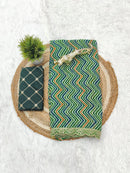 Elegant Bottle Green Zigzag Print Designer Saree with Scalloped Lace Border