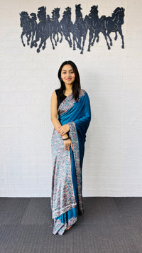 Graceful Teal Blue Designer Saree with Classic Paisley Printed Border