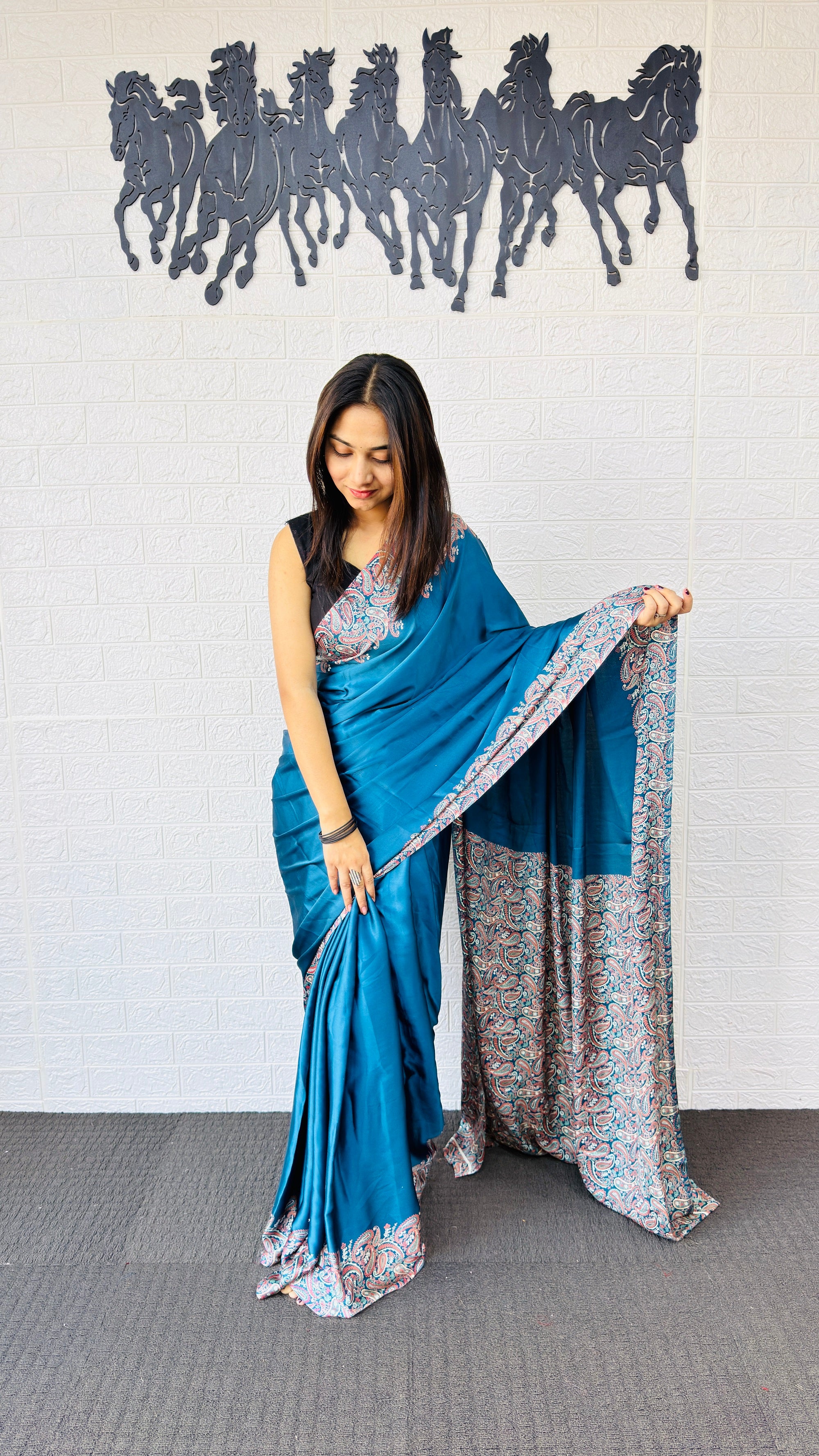 Graceful Teal Blue Designer Saree with Classic Paisley Printed Border