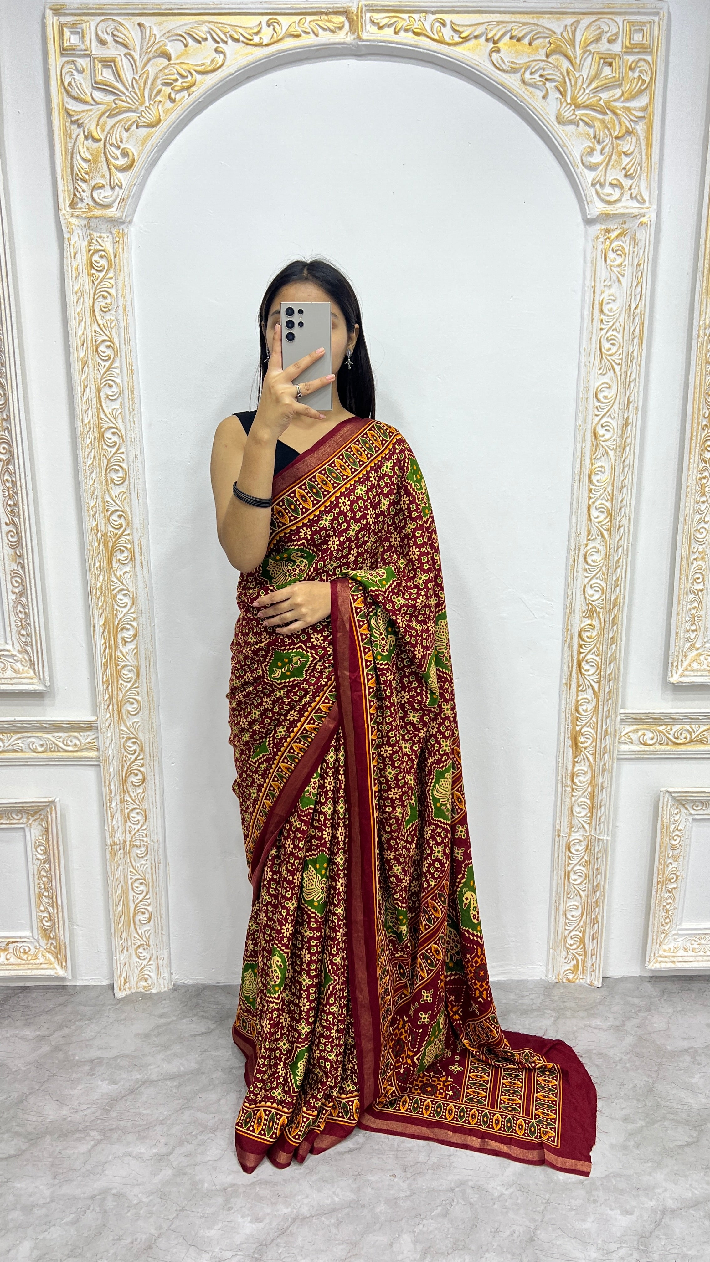 Luxury Deep Maroon Heritage Printed Saree with Green Motifs & Royal Ethnic Border