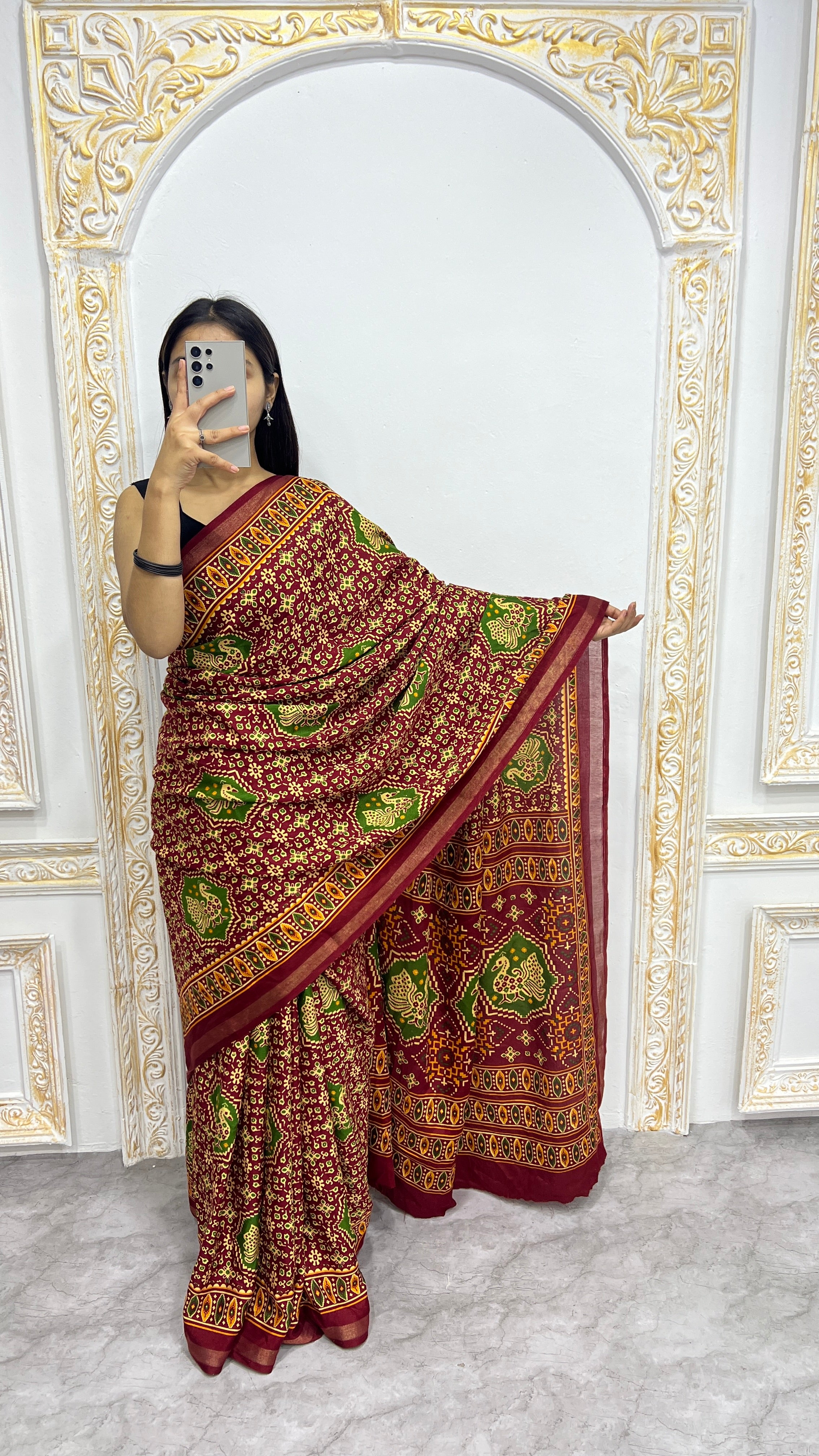 Luxury Deep Maroon Heritage Printed Saree with Green Motifs & Royal Ethnic Border