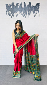 Classic Crimson Red Designer Saree with Deep Green Folk Heritage Border