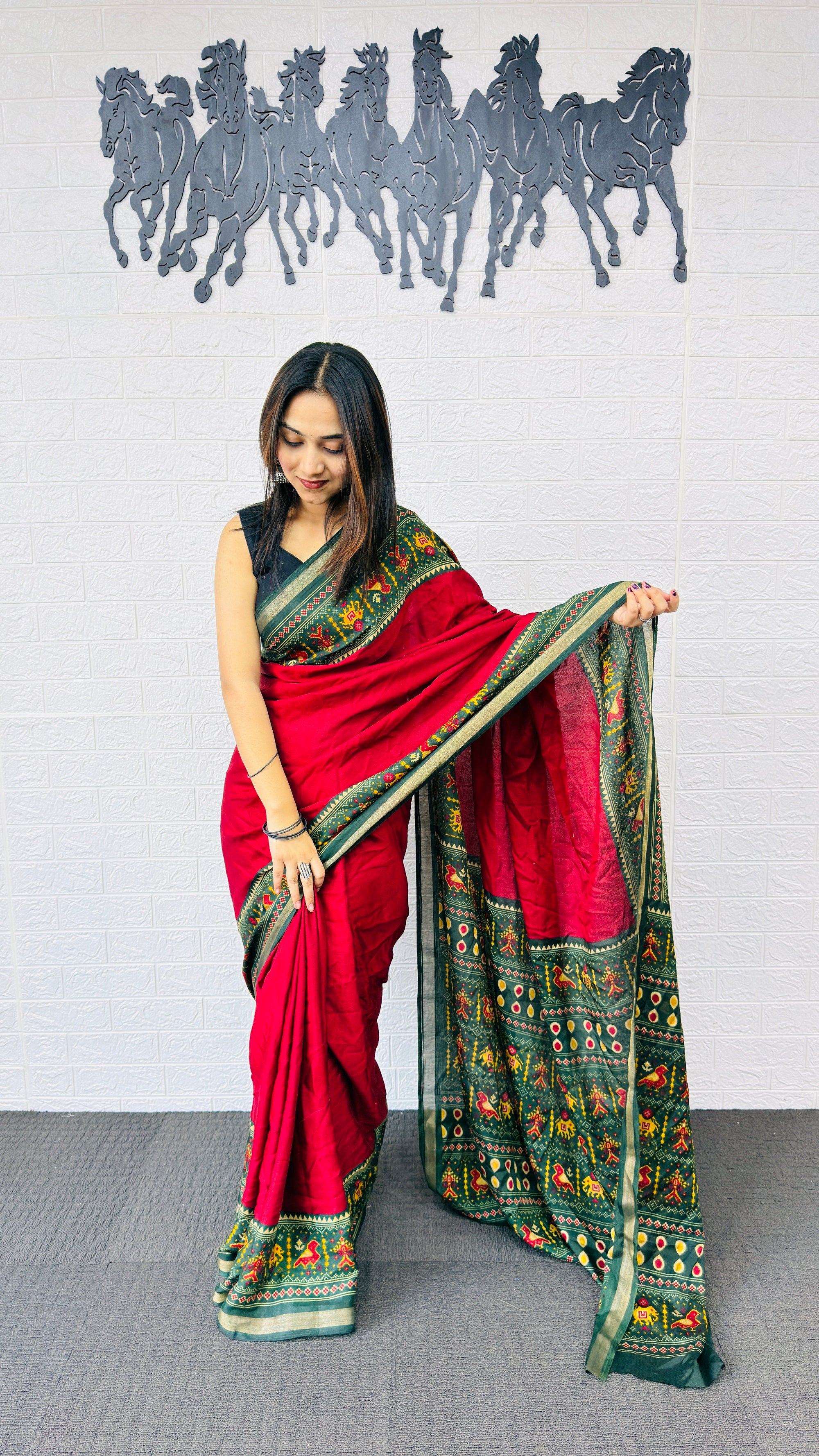 Classic Crimson Red Designer Saree with Deep Green Folk Heritage Border