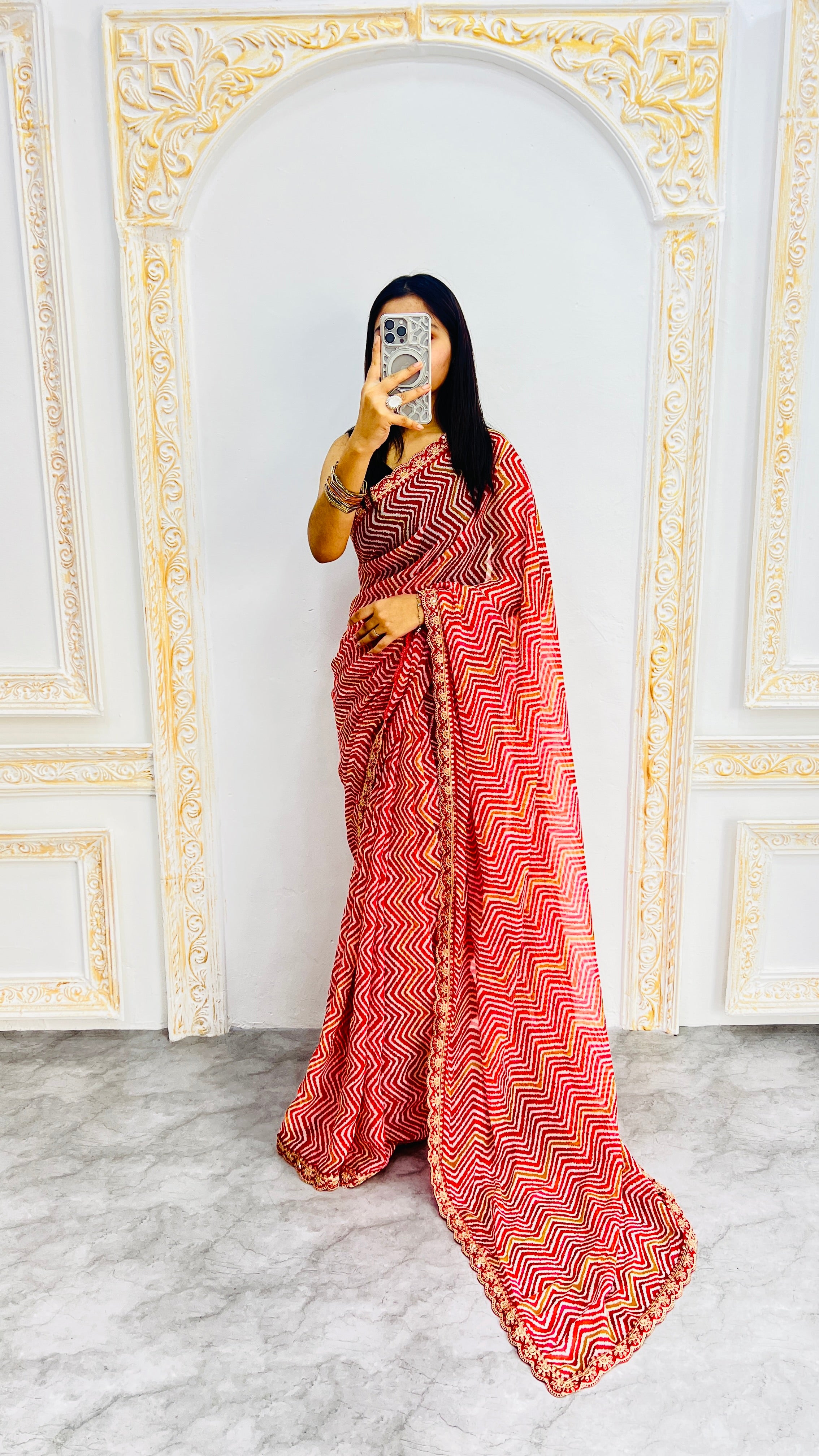 Vibrant Red Zigzag Print Designer Saree with Elegant Lace Border