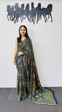 Elegant Teal Green Patola Silk Saree with Multicolor Traditional Weaving | Premium Festive & Cultural Wear