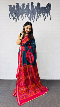 Elegant Teal Blue Designer Saree with Vibrant Pink Heritage Border