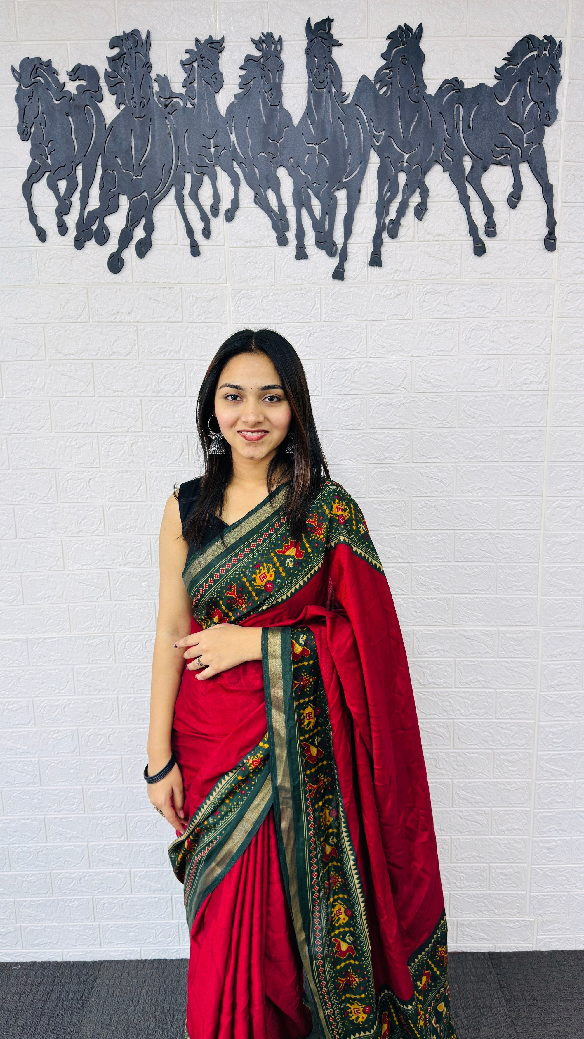 Classic Crimson Red Designer Saree with Deep Green Folk Heritage Border