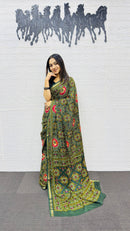 Elegant Bottle Green Patola Silk Saree with Multicolor Traditional Weaving | Premium Festive & Cultural Wear