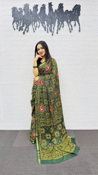 Elegant Bottle Green Patola Silk Saree with Multicolor Traditional Weaving | Premium Festive & Cultural Wear