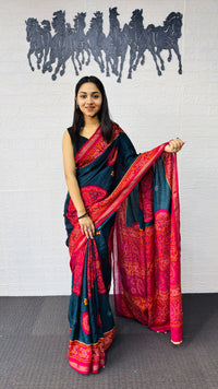 Elegant Teal Blue Designer Saree with Vibrant Pink Heritage Border