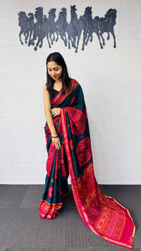 Elegant Teal Blue Designer Saree with Vibrant Pink Heritage Border