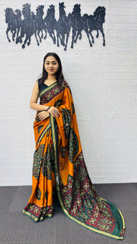 Traditional Mustard Orange Designer Saree with Deep Green Heritage Motifs