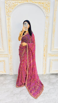Elegant Rani Pink Zigzag Print Designer Saree with Decorative Lace Border