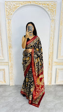 Noir Regal Mal Mal Silk Saree with Antique Gold Floral Zari & Crimson Border