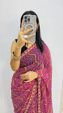 Elegant Rani Pink Zigzag Print Designer Saree with Decorative Lace Border