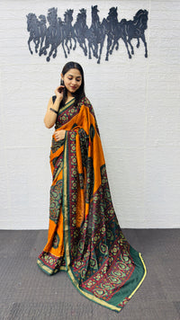 Traditional Mustard Orange Designer Saree with Deep Green Heritage Motifs