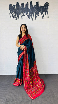 Elegant Teal Blue Designer Saree with Vibrant Red Folk Art Pallu
