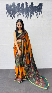 Traditional Mustard Orange Designer Saree with Deep Green Heritage Motifs