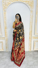 Noir Regal Mal Mal Silk Saree with Antique Gold Floral Zari & Crimson Border