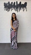 Elegant Charcoal Grey Floral Print Saree with Designer Ethnic Border & Tassels