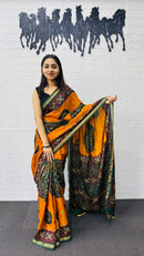 Traditional Mustard Orange Designer Saree with Deep Green Heritage Motifs