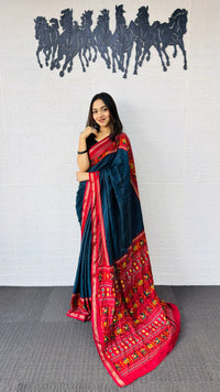 Elegant Teal Blue Designer Saree with Vibrant Red Folk Art Pallu