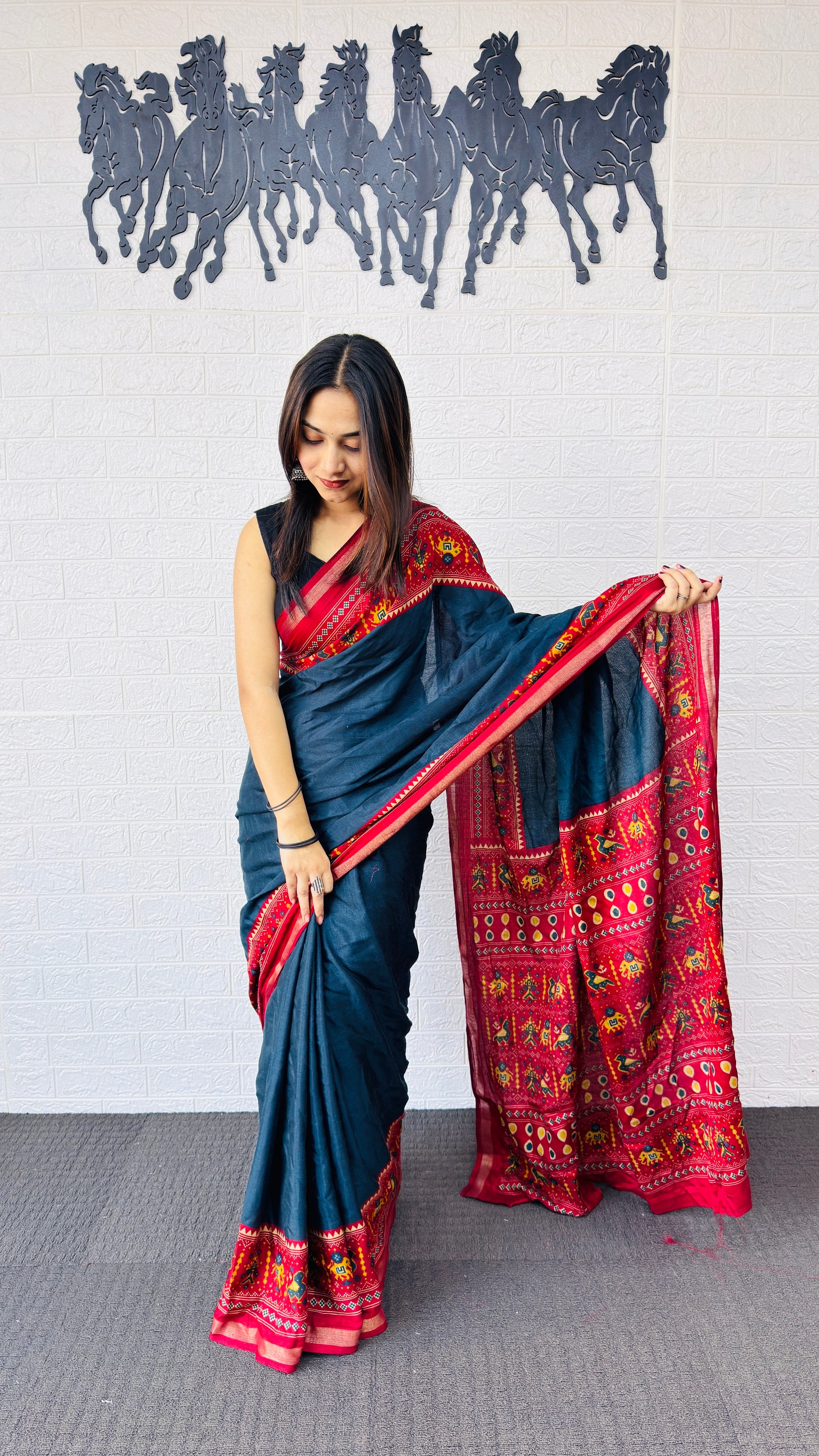 Elegant Teal Blue Designer Saree with Vibrant Red Folk Art Pallu