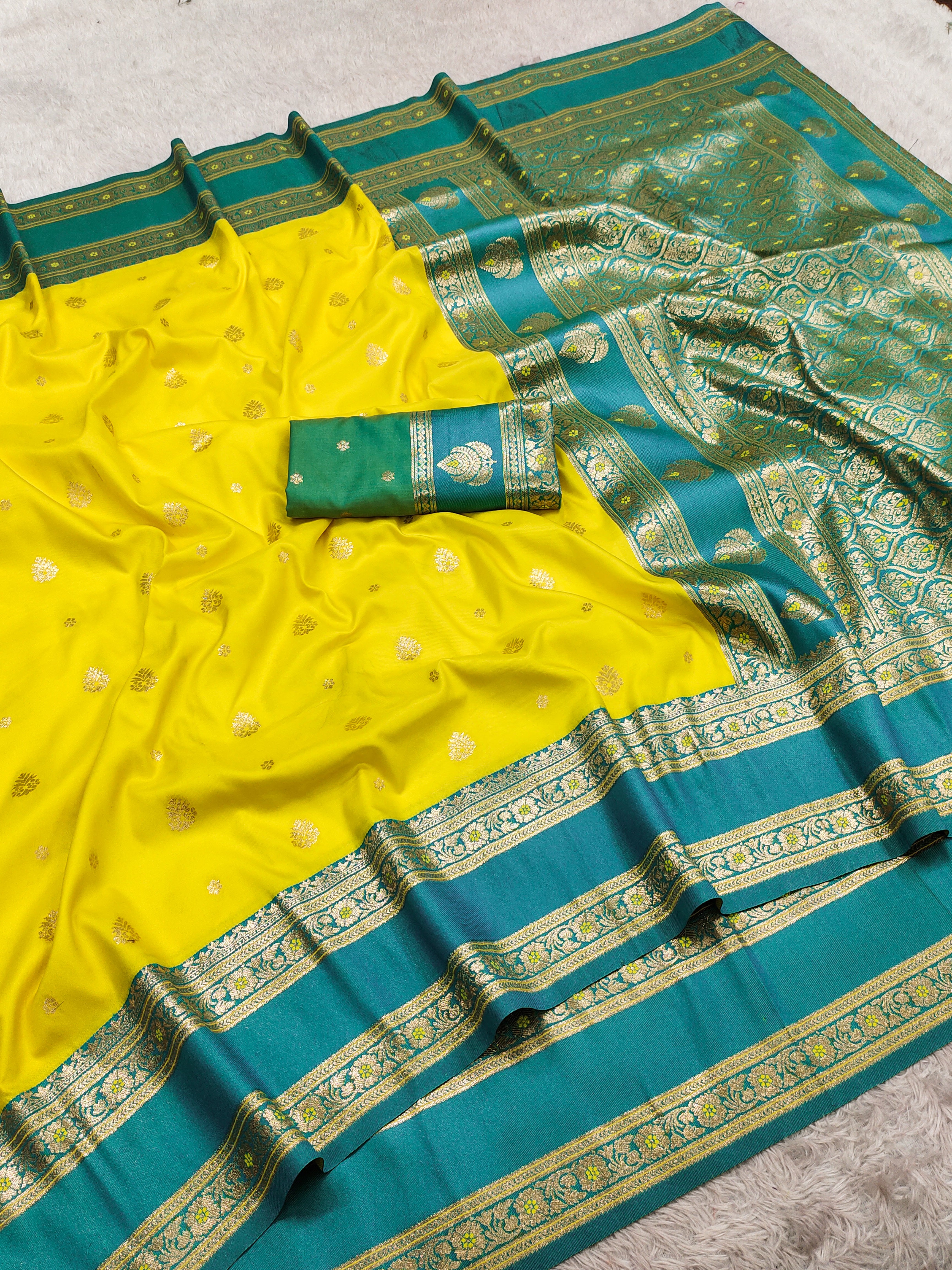 Bright Yellow Silk Saree with Teal Green Antique Zari Border & Rich Woven Pallu