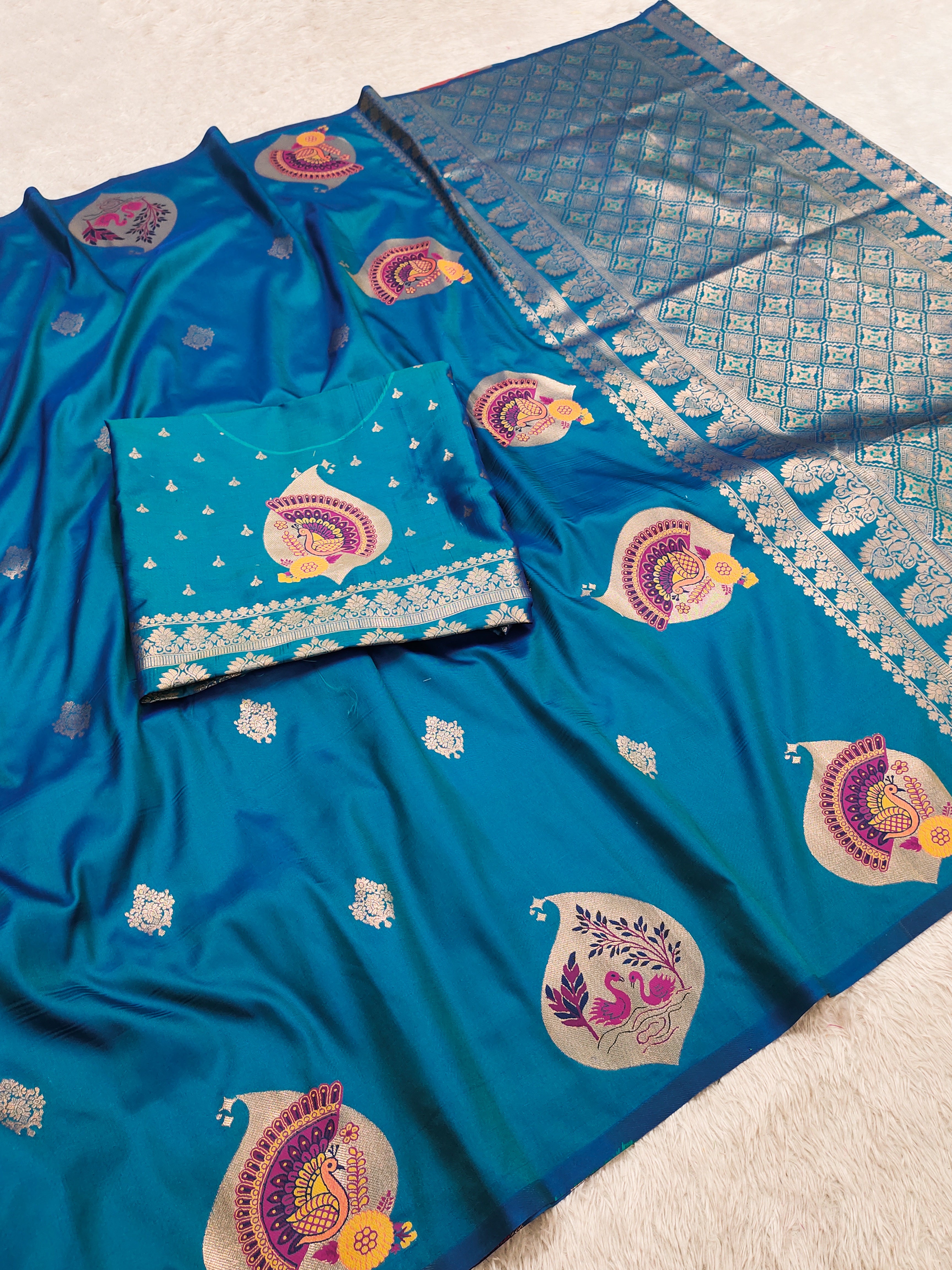 Royal Teal Blue Banarasi Silk Saree with Peacock & Kalash Motifs and Antique Silver Zari Pallu
