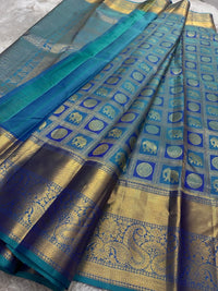 Shimmering Peacock Teal & Gold Kanchipuram Silk Saree with Paisley & Elephant Motifs
