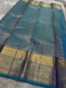 Shimmering Peacock Teal & Gold Kanchipuram Silk Saree with Paisley & Elephant Motifs