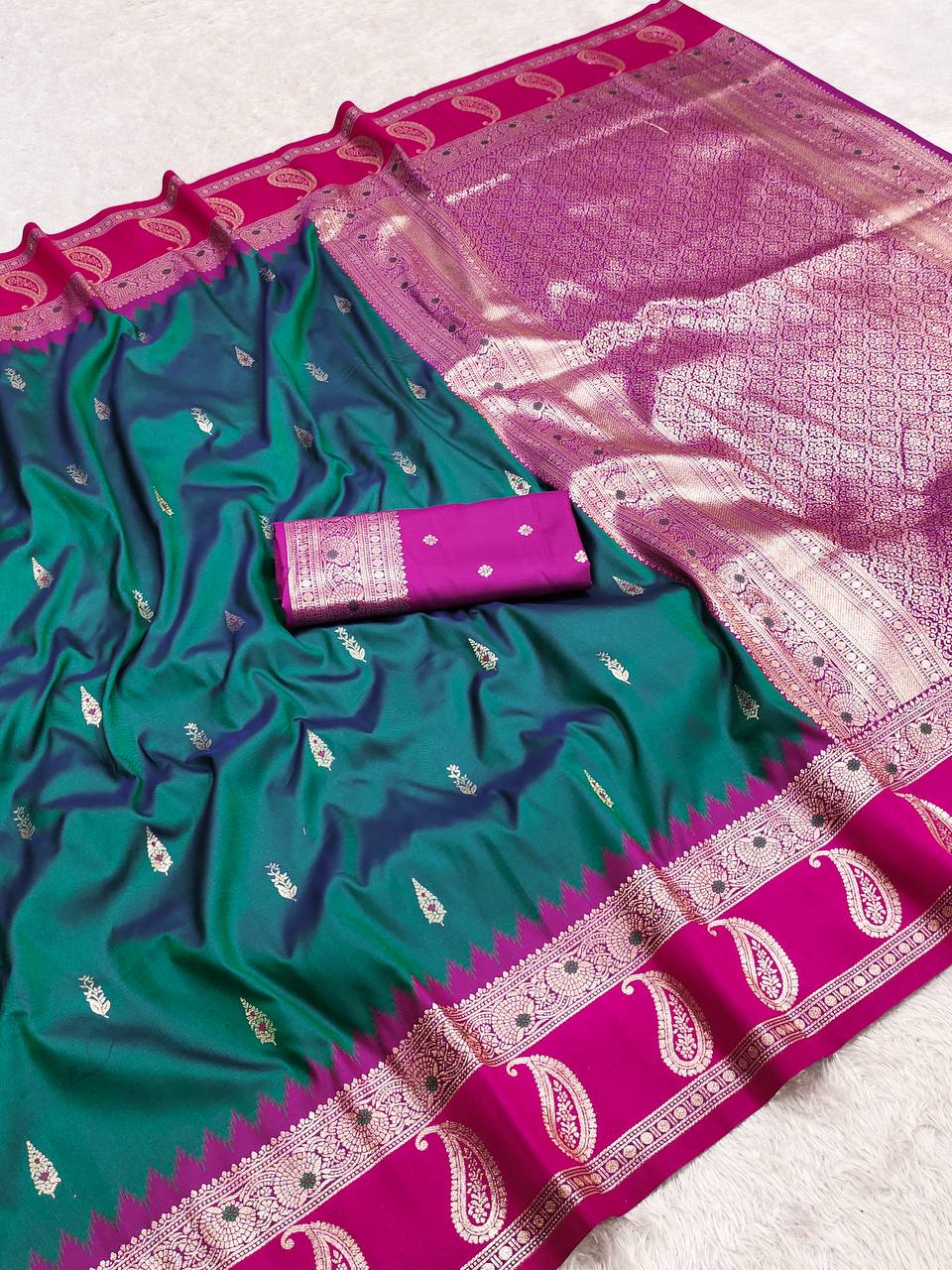 Emerald Green Silk Saree with Rani Pink Paisley Border & Heavy Gold Zari Pallu