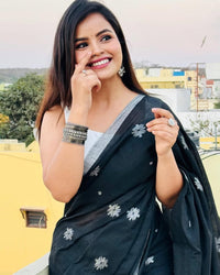 Classic Black Soft Chiffon Saree with Silver Floral Motifs and Minimal Border