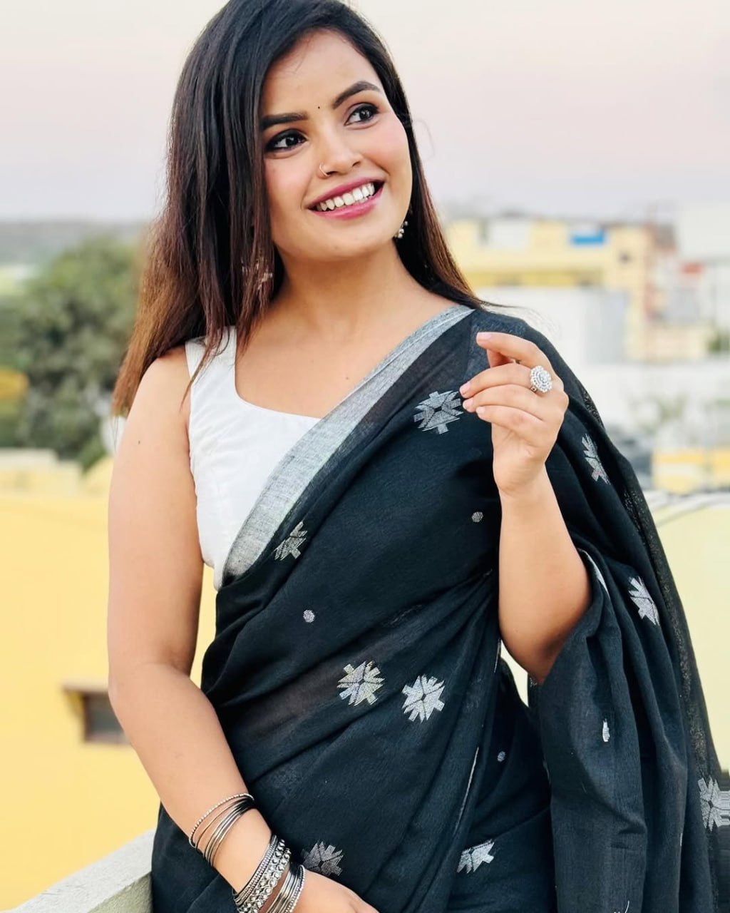 Classic Black Soft Chiffon Saree with Silver Floral Motifs and Minimal Border