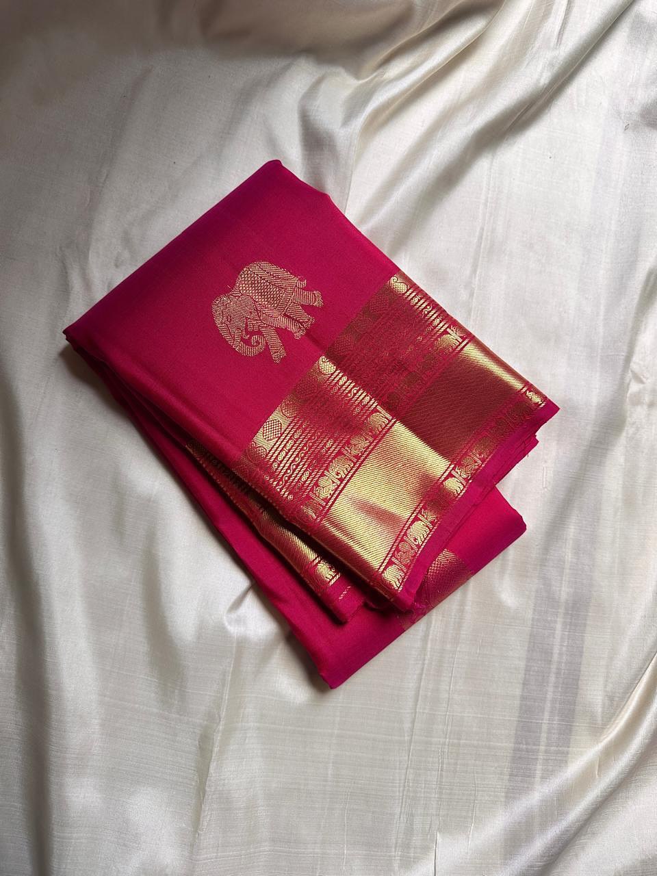 Rani Pink Banarasi Silk Saree with Gold Zari Elephant Motif & Rich Traditional Border