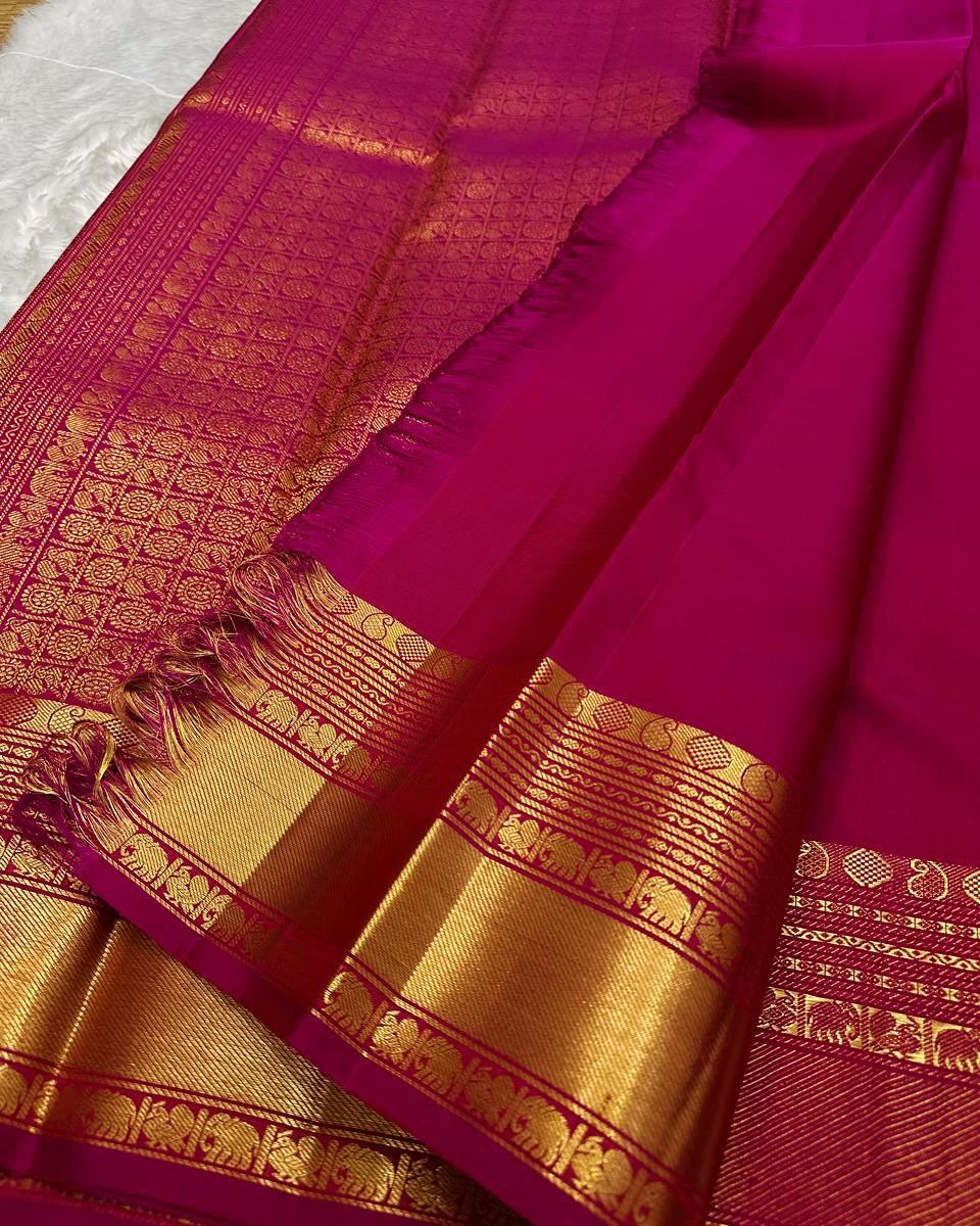 Rani Pink Banarasi Silk Saree with Gold Zari Elephant Motif & Rich Traditional Border